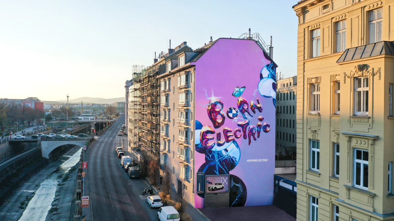 Large colourful mural on the side of a building in daylight – BMW - BORNELECTRIC, Linke Wienzeile, Vienna, Austria