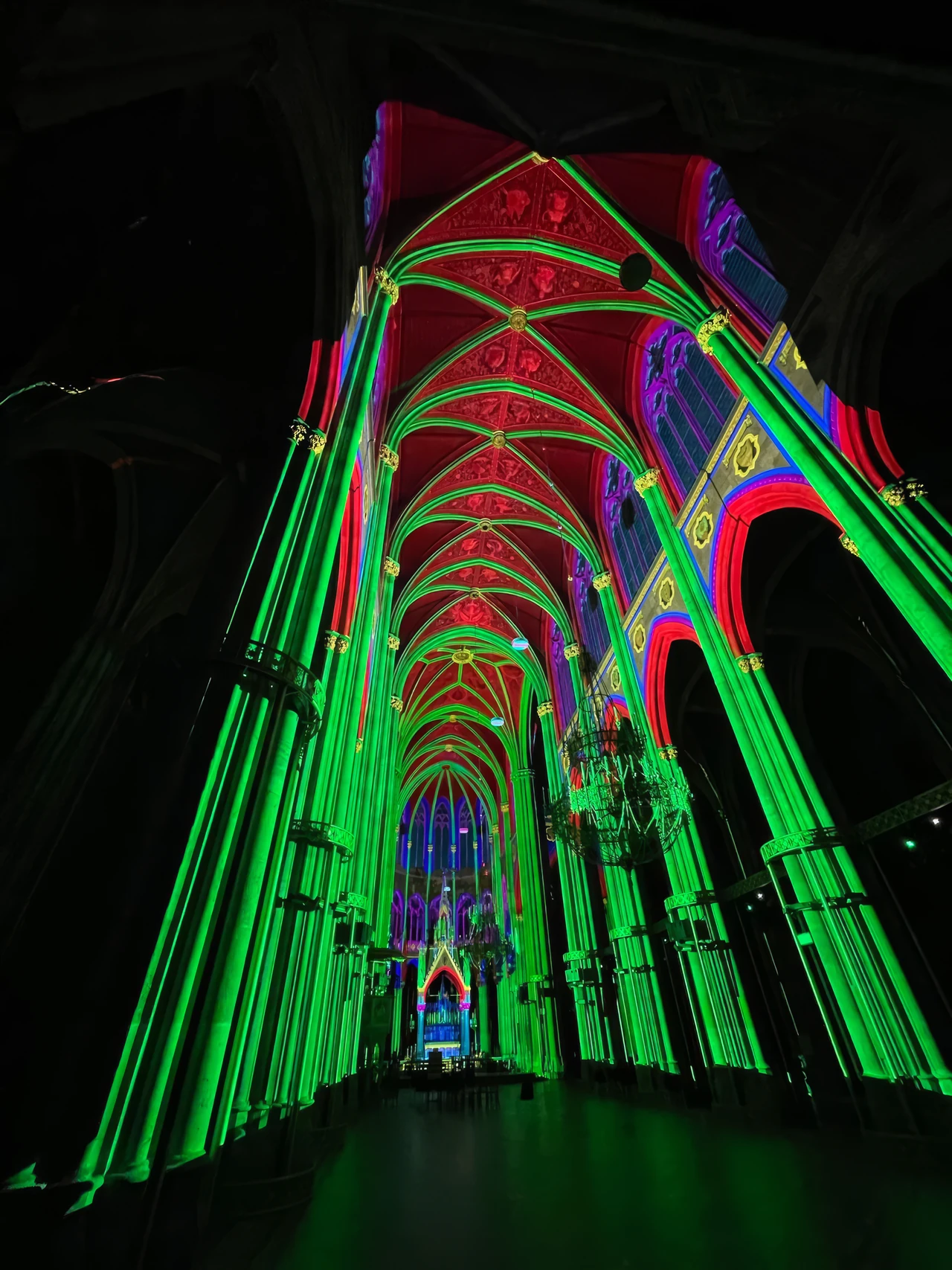 Upward view of projected lines in the church vaults – LIGHT OF CREATION, Votivkirche, Vienna, Austria