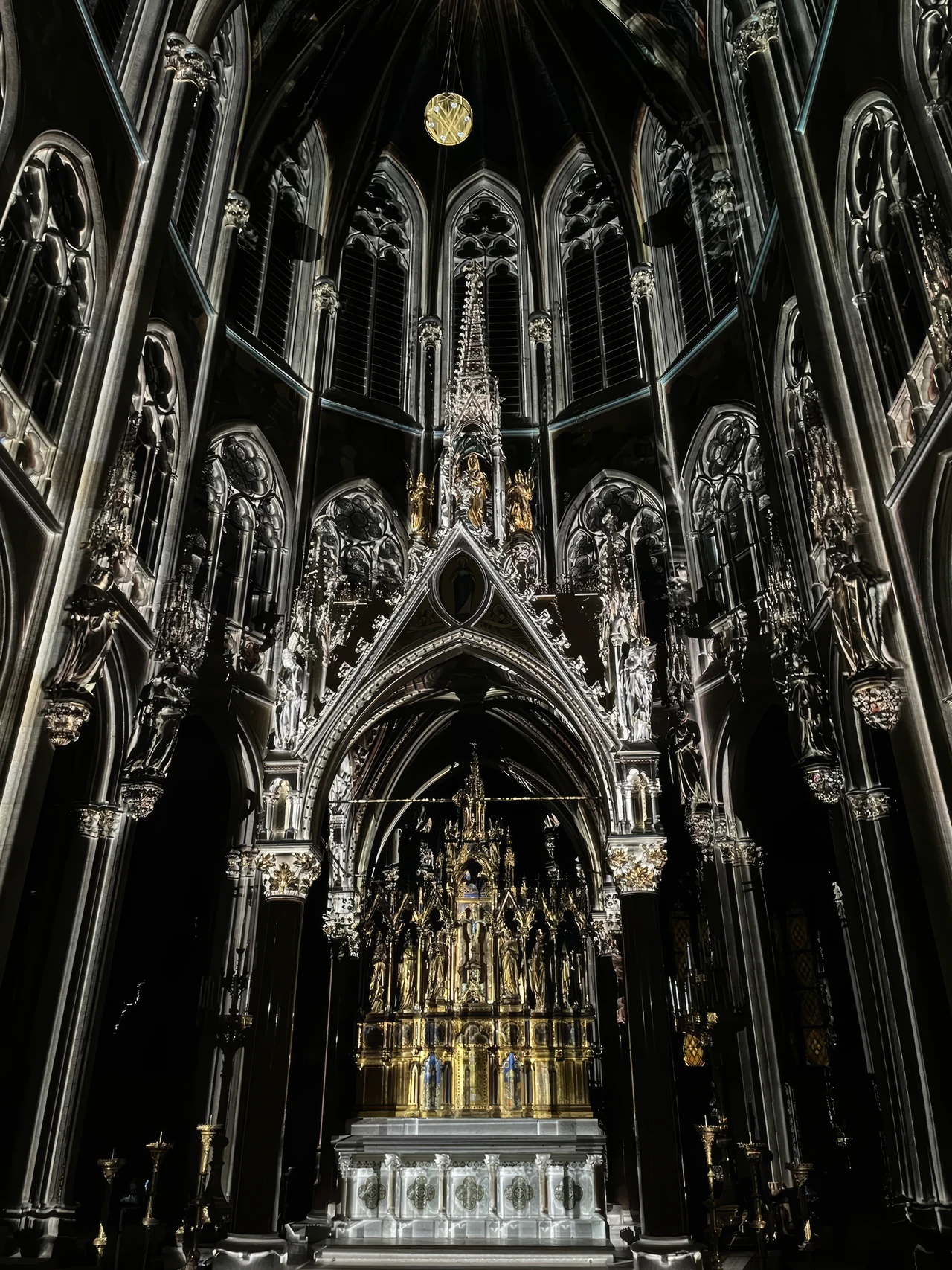 White outline projections on dark church architecture – LIGHT OF CREATION, Votivkirche, Vienna, Austria