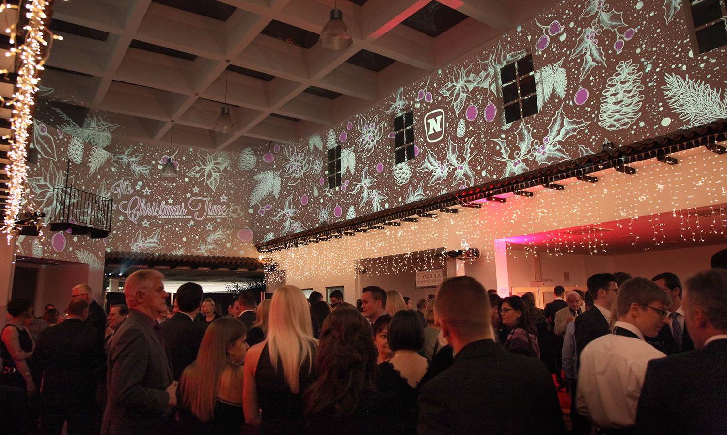 White star and brand imagery projected above guests – Novomatic, Pyramide, Vösendorf, Austria