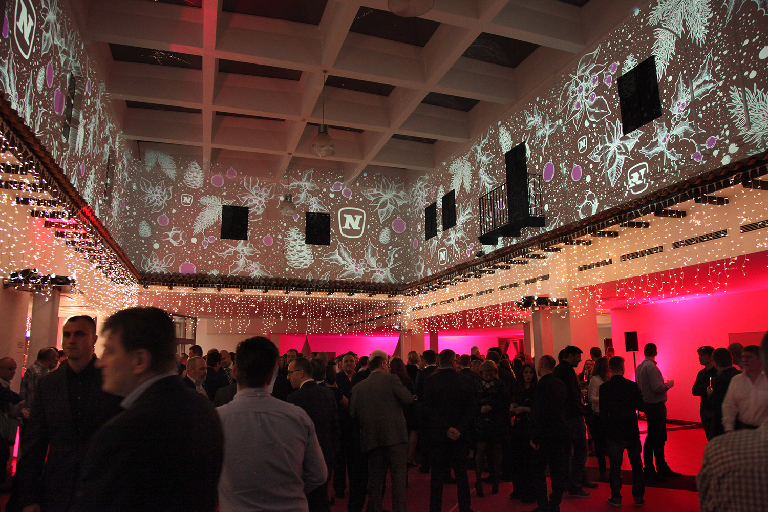 White star and brand imagery projected above guests – Novomatic, Pyramide, Vösendorf, Austria