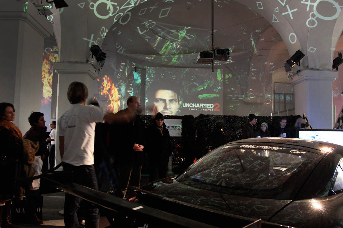 Displayed Gran Turismo car in front of projected game imagery – Sony PlayStation, Ovalhalle, MuseumsQuartier, Vienna, Austria
