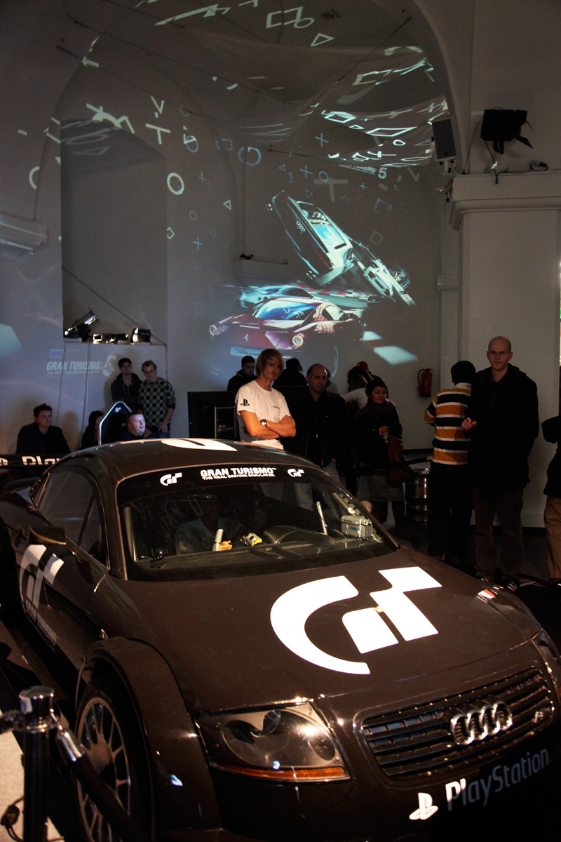 Displayed Gran Turismo car in front of projected game imagery – Sony PlayStation, Ovalhalle, MuseumsQuartier, Vienna, Austria