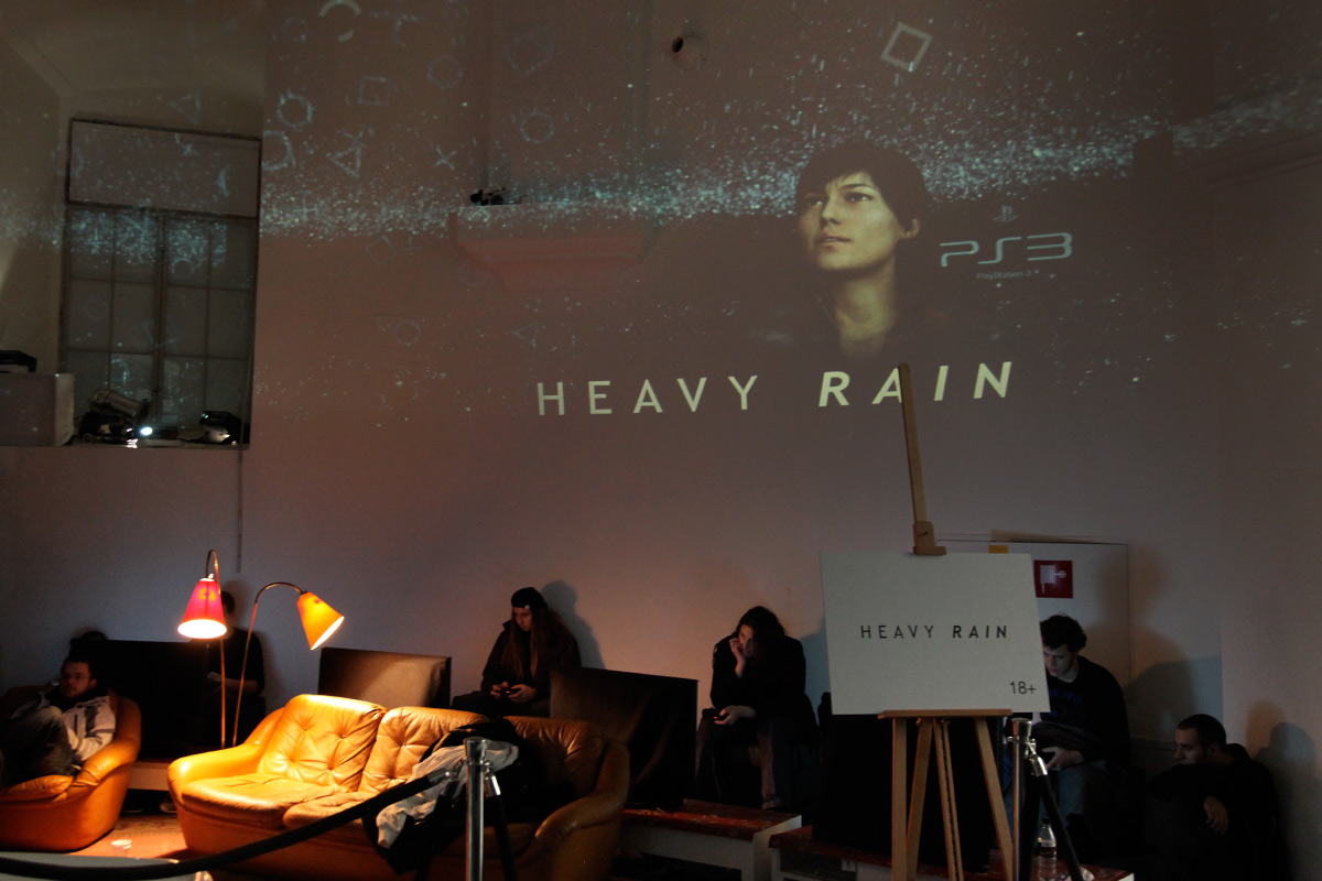 Heavy Rain imagery projected onto the wall behind seating – Sony PlayStation, Ovalhalle, MuseumsQuartier, Vienna, Austria