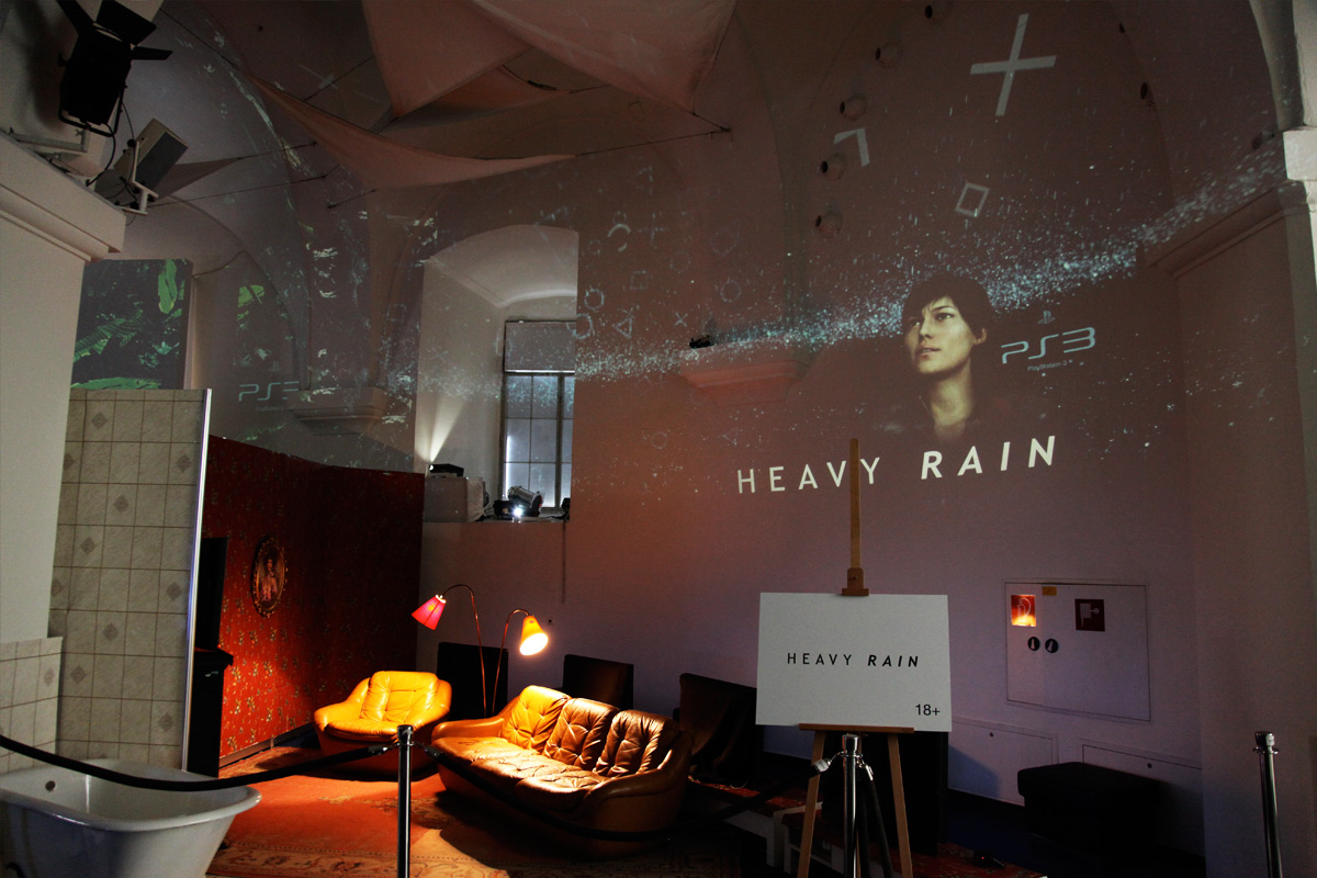 Heavy Rain imagery projected onto the wall behind seating – Sony PlayStation, Ovalhalle, MuseumsQuartier, Vienna, Austria