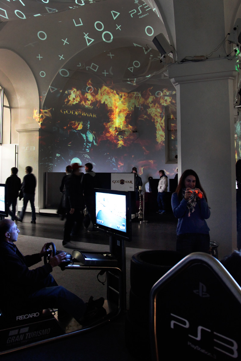PlayStation game imagery projected above the gaming stations – Sony PlayStation, Ovalhalle, MuseumsQuartier, Vienna, Austria