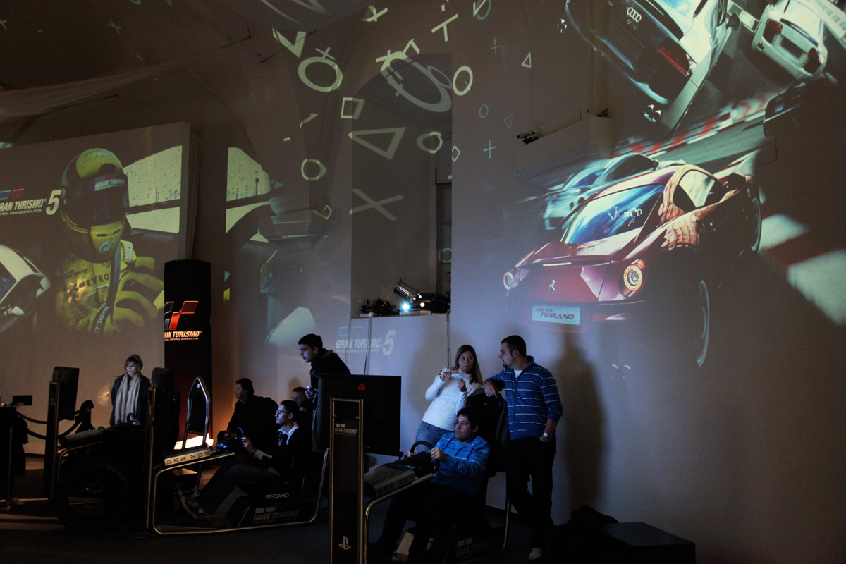 PlayStation game imagery projected above the gaming stations – Sony PlayStation, Ovalhalle, MuseumsQuartier, Vienna, Austria