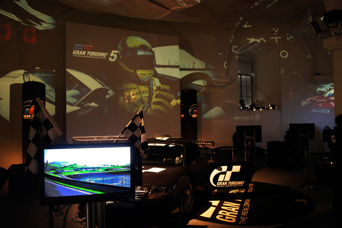 PlayStation game imagery projected above the gaming stations – Sony PlayStation, Ovalhalle, MuseumsQuartier, Vienna, Austria