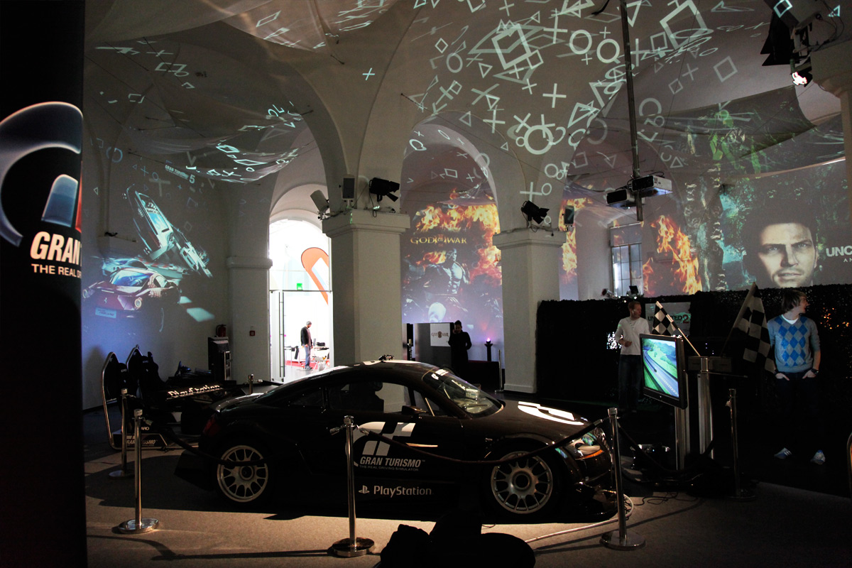 PlayStation game imagery projected above the gaming stations – Sony PlayStation, Ovalhalle, MuseumsQuartier, Vienna, Austria