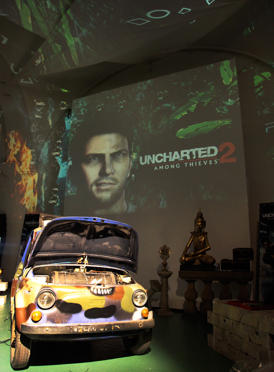 Uncharted imagery projected behind a displayed car – Sony PlayStation, Ovalhalle, MuseumsQuartier, Vienna, Austria