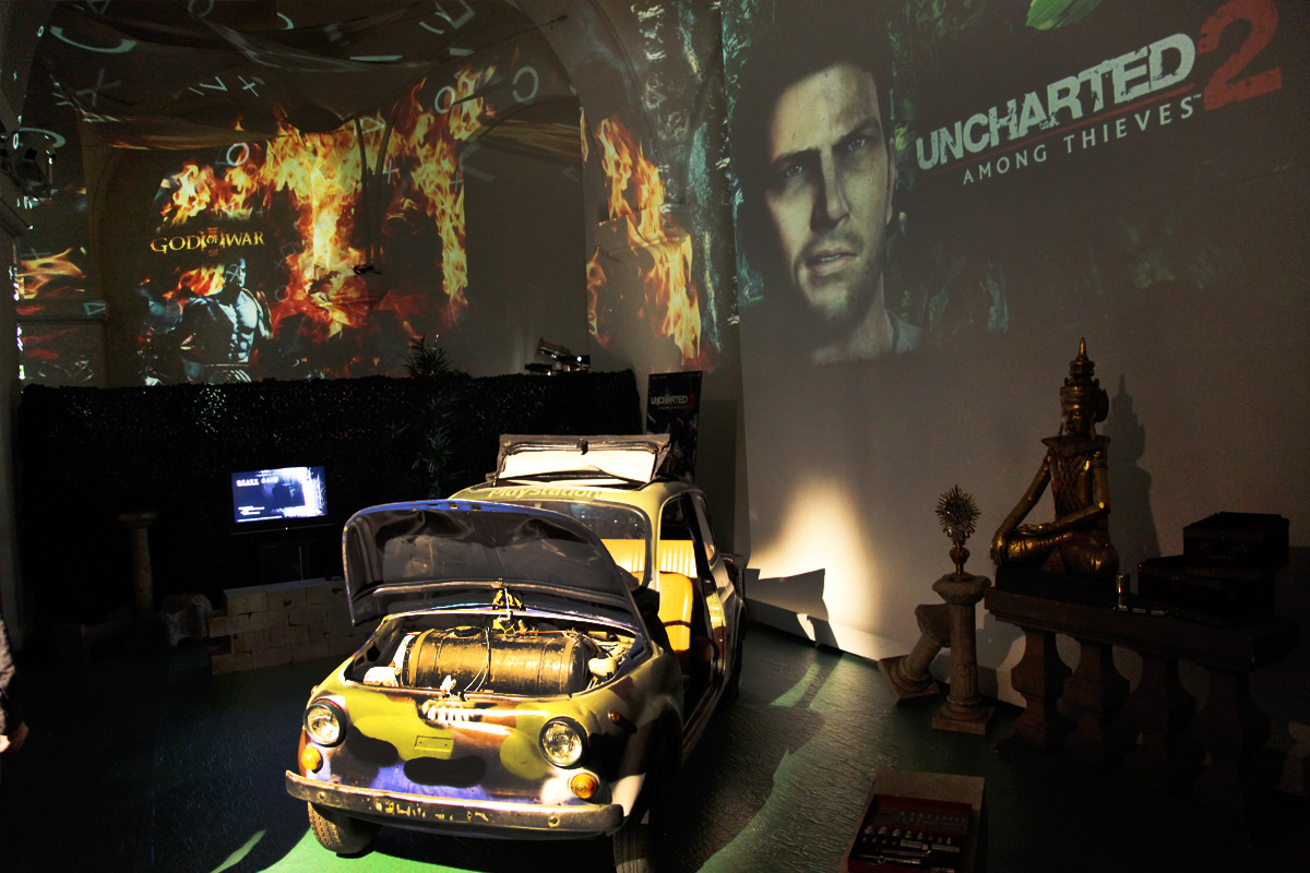 Uncharted imagery projected behind a displayed car – Sony PlayStation, Ovalhalle, MuseumsQuartier, Vienna, Austria