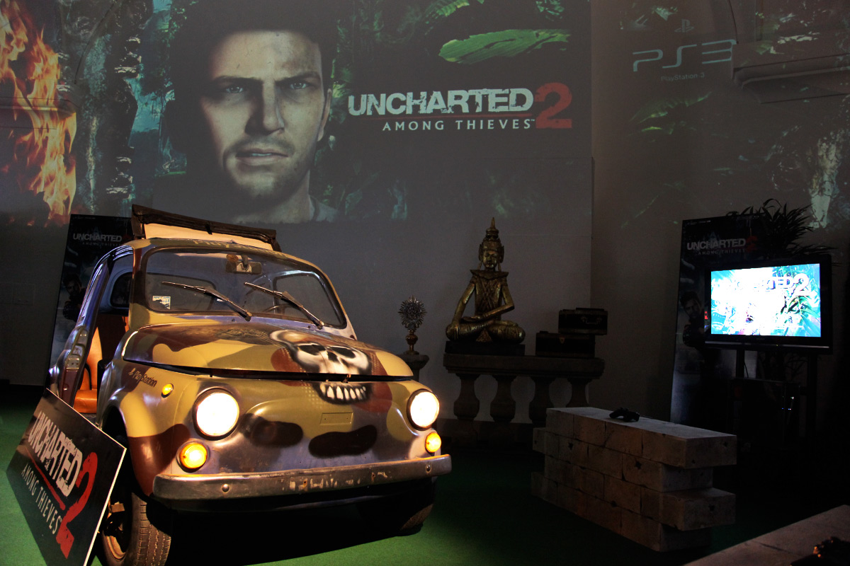 Uncharted imagery projected behind a displayed car – Sony PlayStation, Ovalhalle, MuseumsQuartier, Vienna, Austria