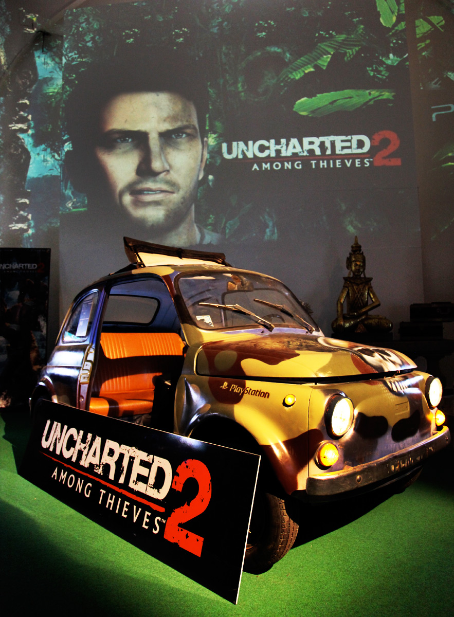 Uncharted imagery projected behind a displayed car – Sony PlayStation, Ovalhalle, MuseumsQuartier, Vienna, Austria