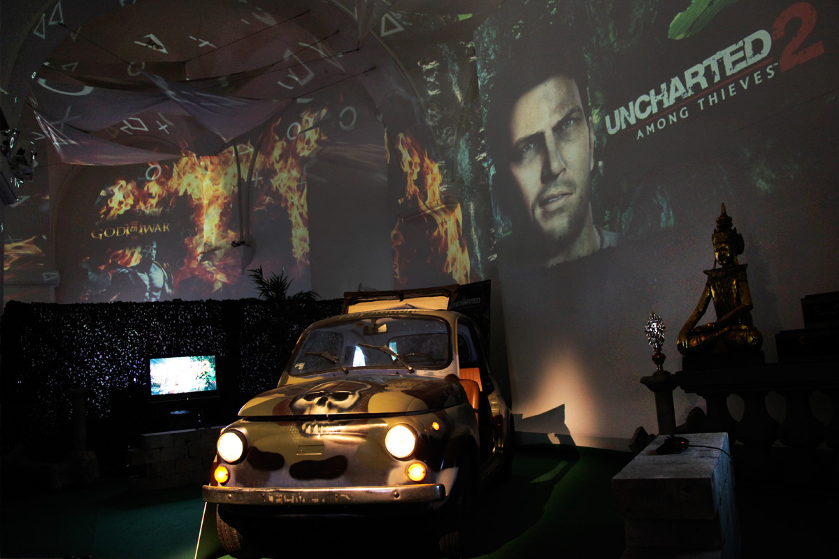 Uncharted imagery projected behind a displayed car – Sony PlayStation, Ovalhalle, MuseumsQuartier, Vienna, Austria