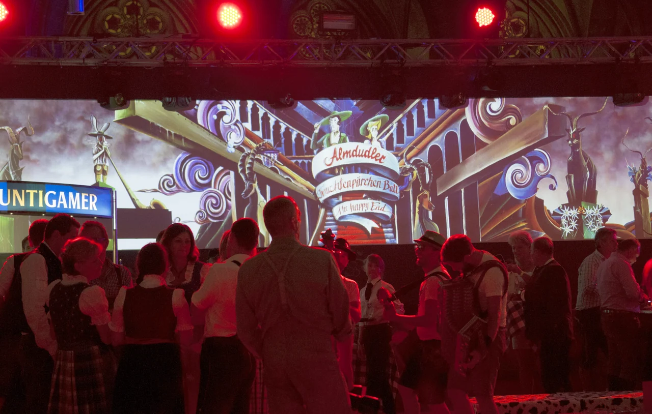Illustrations as a panoramic projection behind ball guests – ALMDUDLER TRACHTEN-PÄRCHENBALL, City Hall, Vienna, Austria