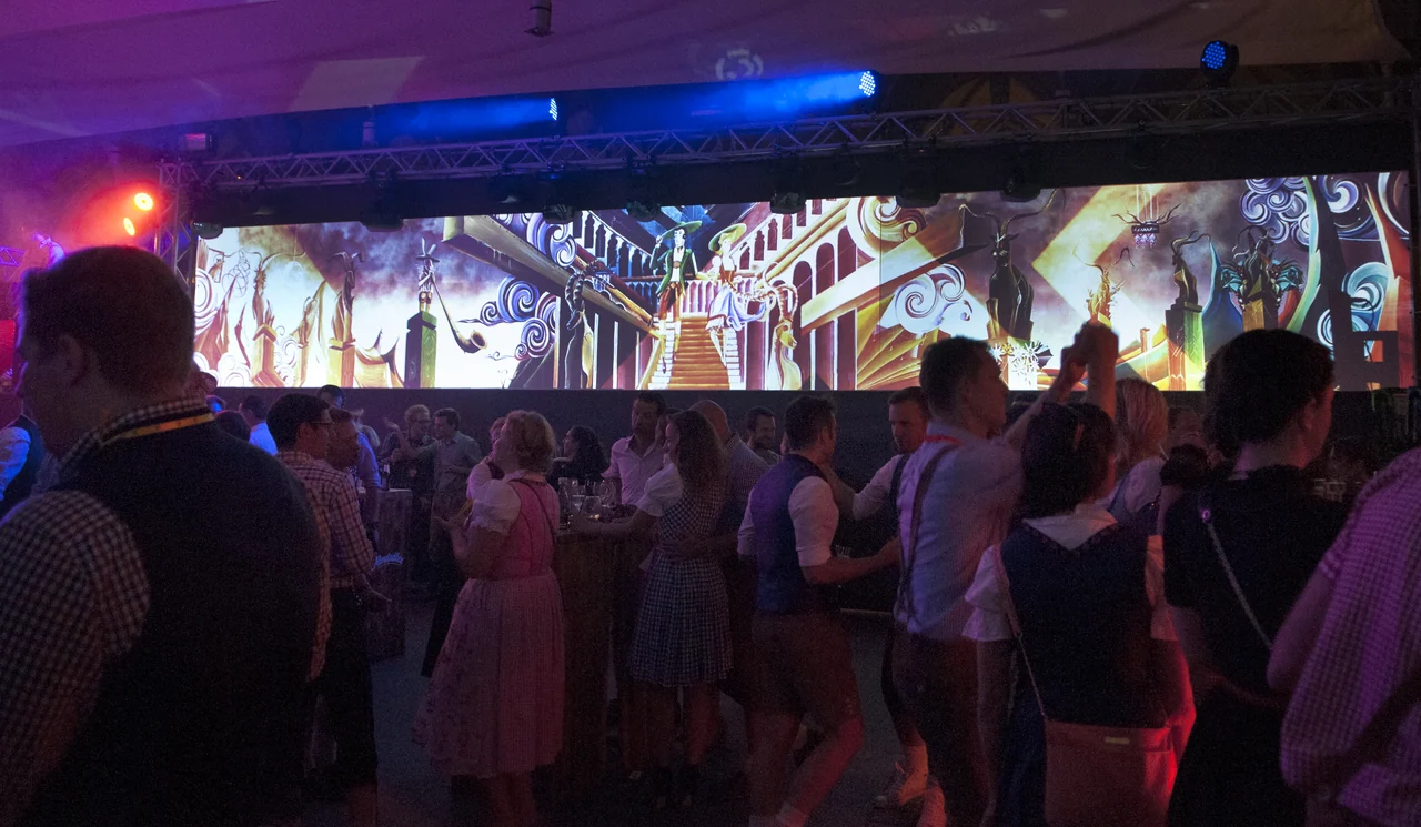 Illustrations as a panoramic projection behind ball guests – ALMDUDLER TRACHTEN-PÄRCHENBALL, City Hall, Vienna, Austria