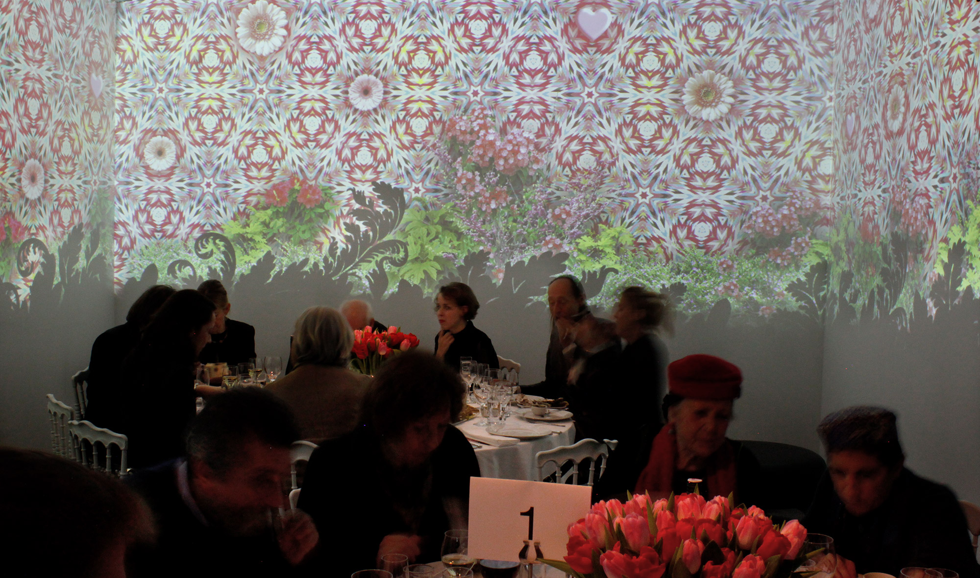 Close view of ornamental projections behind guests – Art Brut, Kunstforum, Vienna, Austria