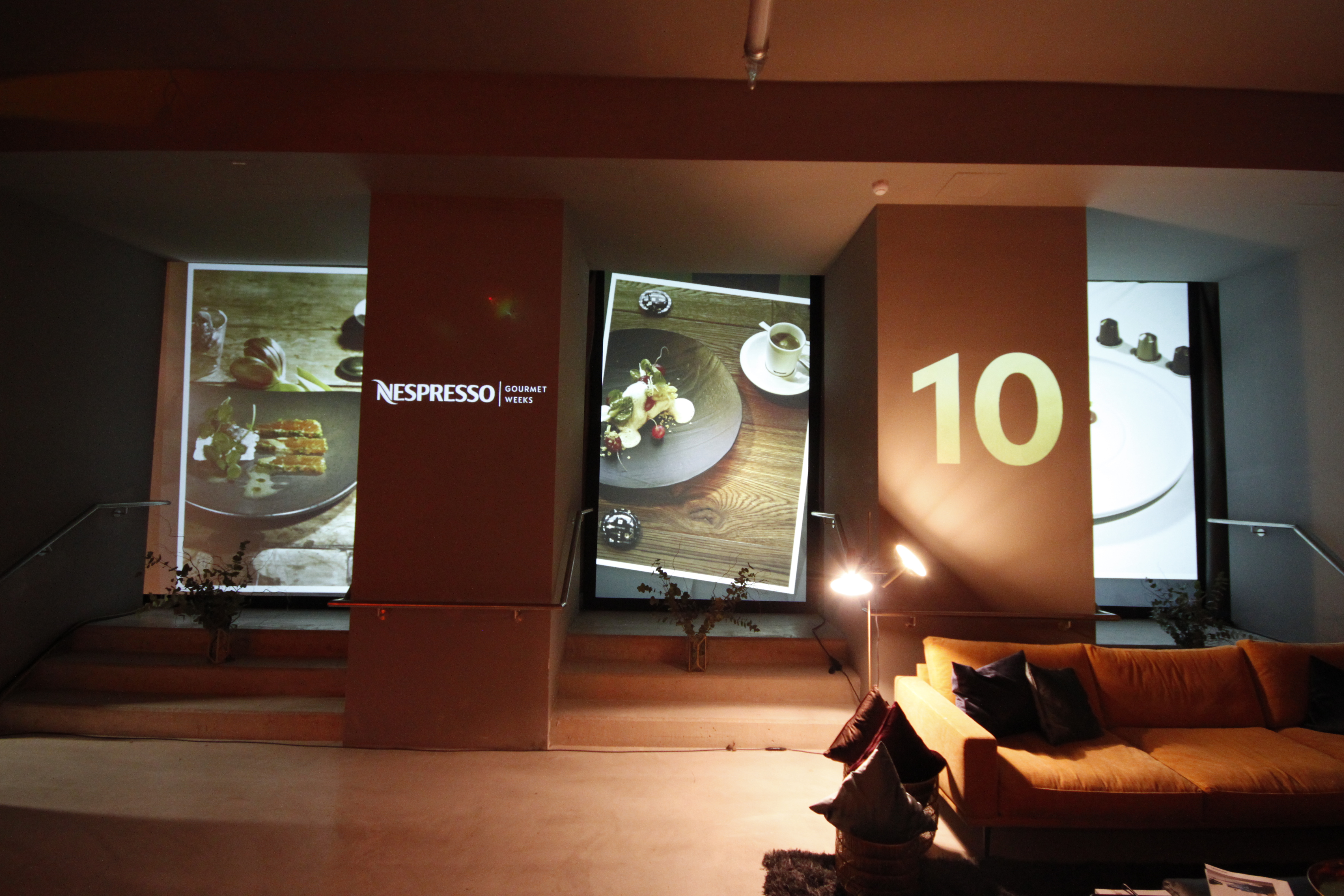 Nespresso imagery and anniversary lettering projected around the room – Nespresso, Palais Wertheim, Vienna, Austria