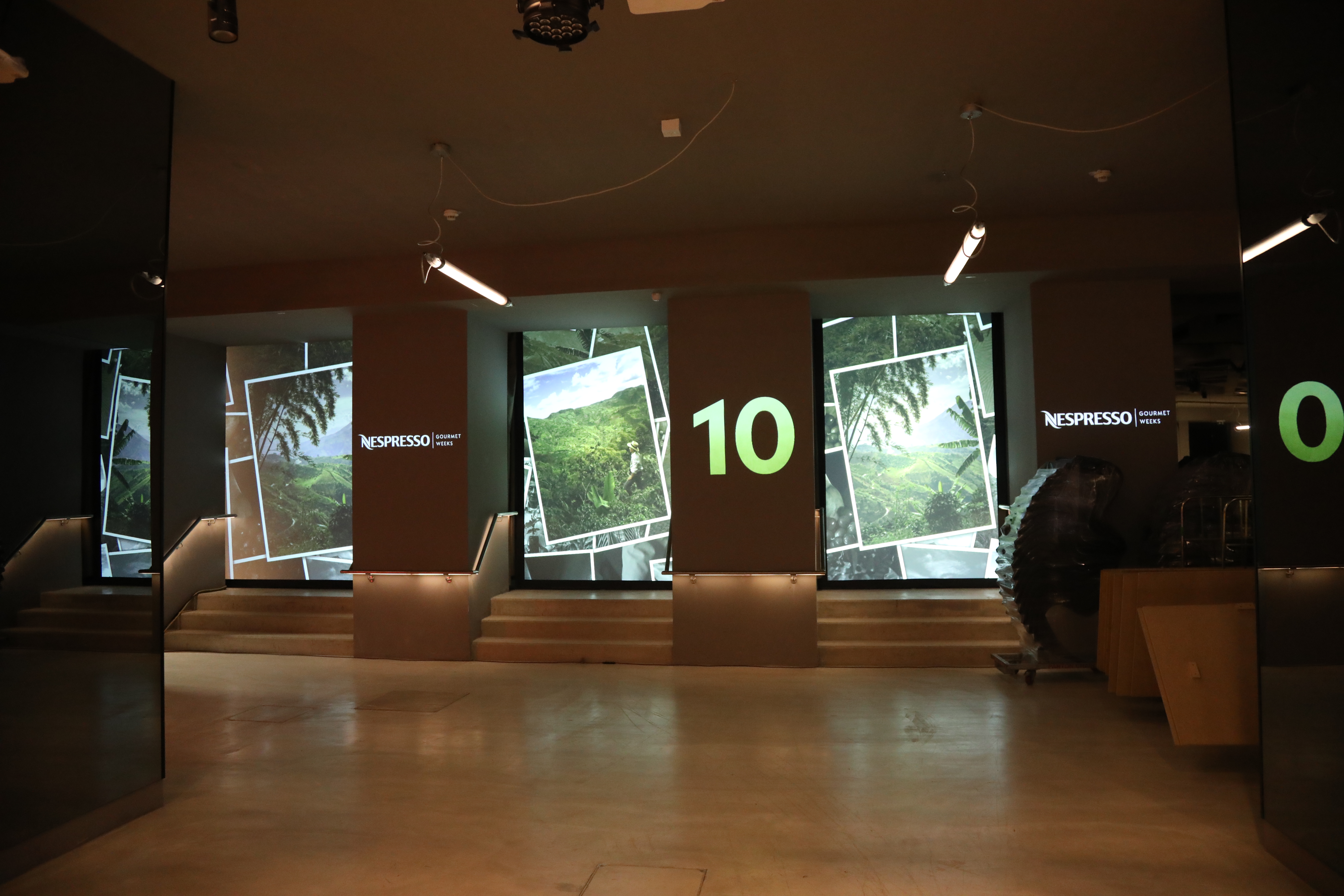Nespresso imagery and anniversary lettering projected around the room – Nespresso, Palais Wertheim, Vienna, Austria